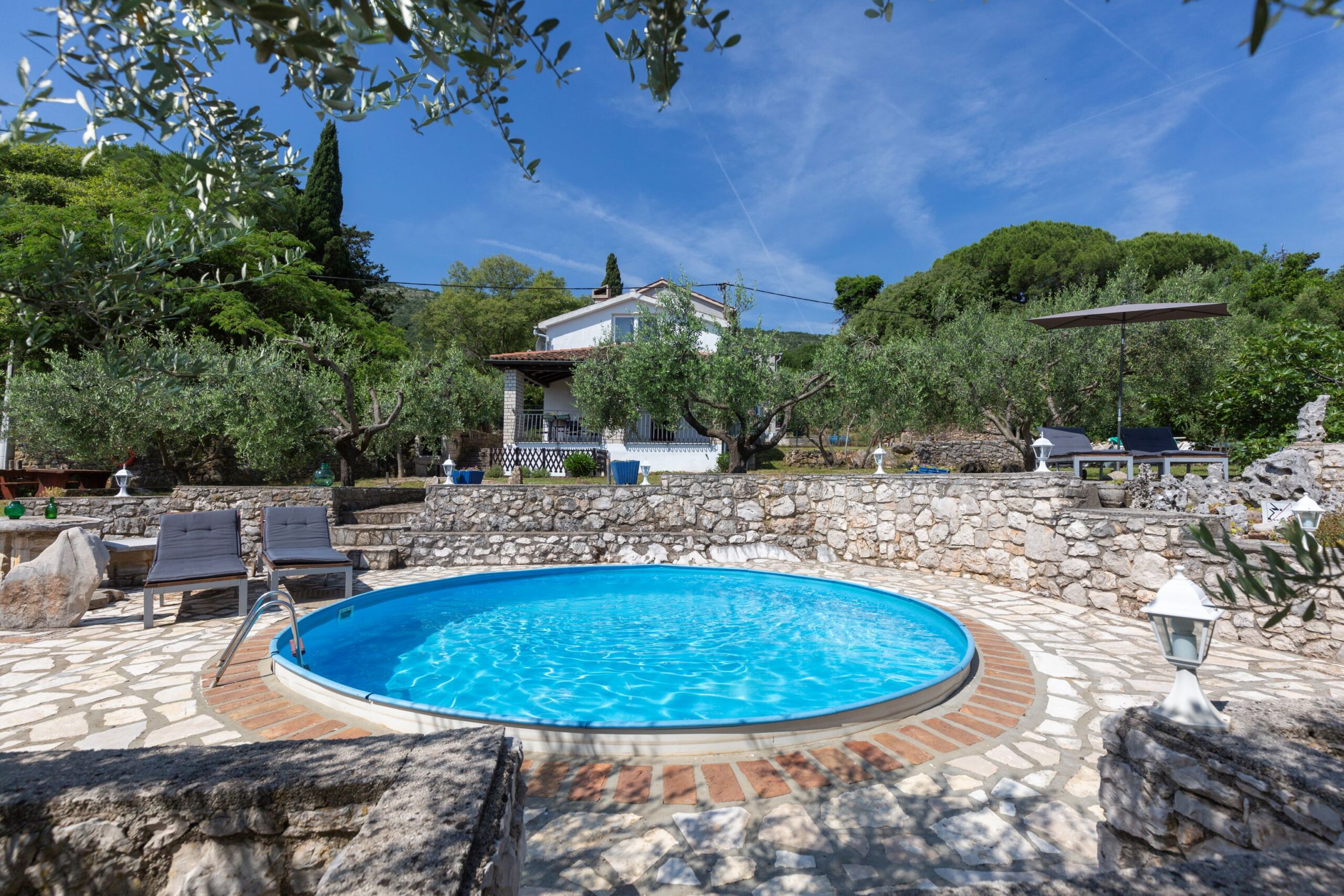 Pool with the view of the house