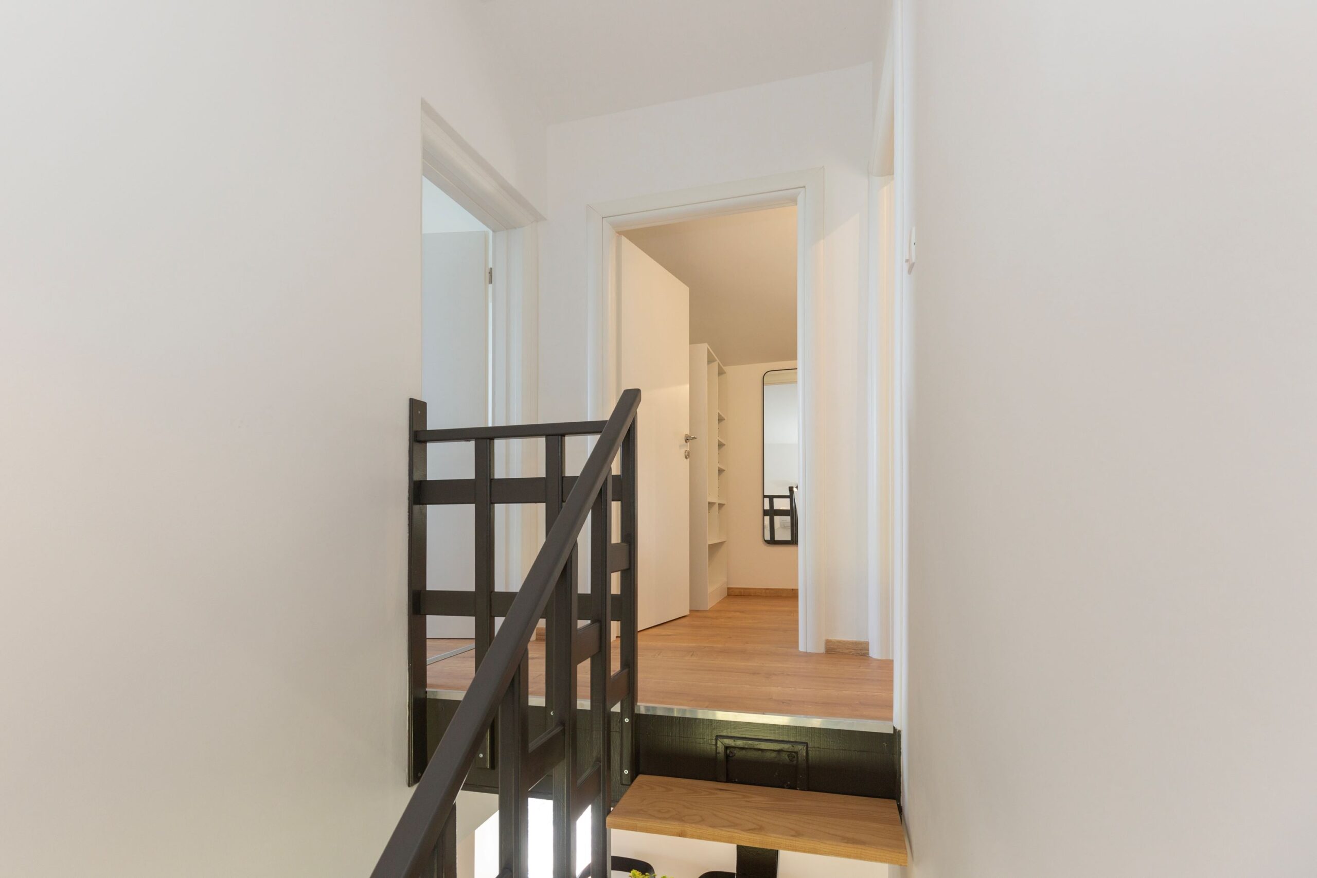 Top of the stairs to the upper floor where all three bedrooms are situated