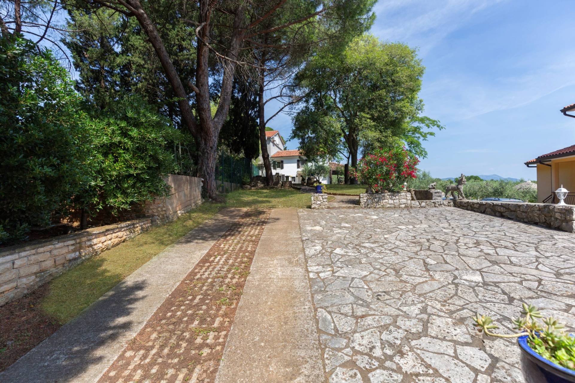 A view of the parking place on the entrance to the house